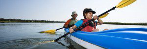 Two people in a canoe on the water.